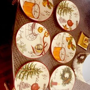 Set of six Williams Sonoma Christmas 9” Salad plates depicting Christmas Carols